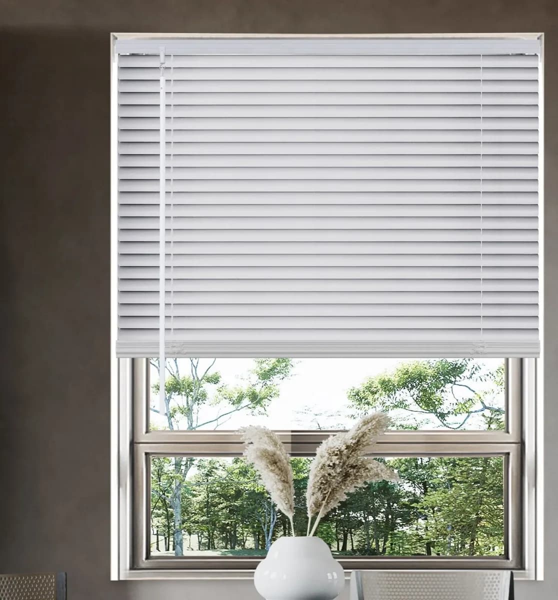 Faux wood blinds raised with a garden view